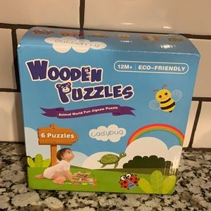 Wooden puzzles. 6 toddler puzzles. Magifire. Never been opened or used.